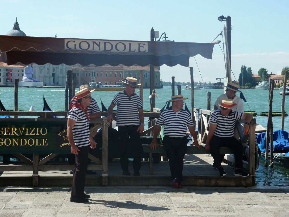 Gondaliers Venice 2013 awaiting the next couple seeking a romantic ride