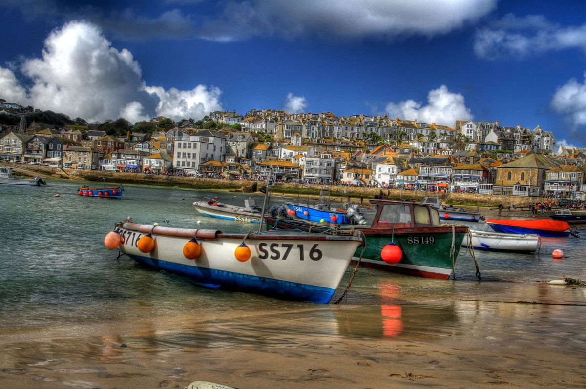 Fishing boats on the beach of a cornish harbour